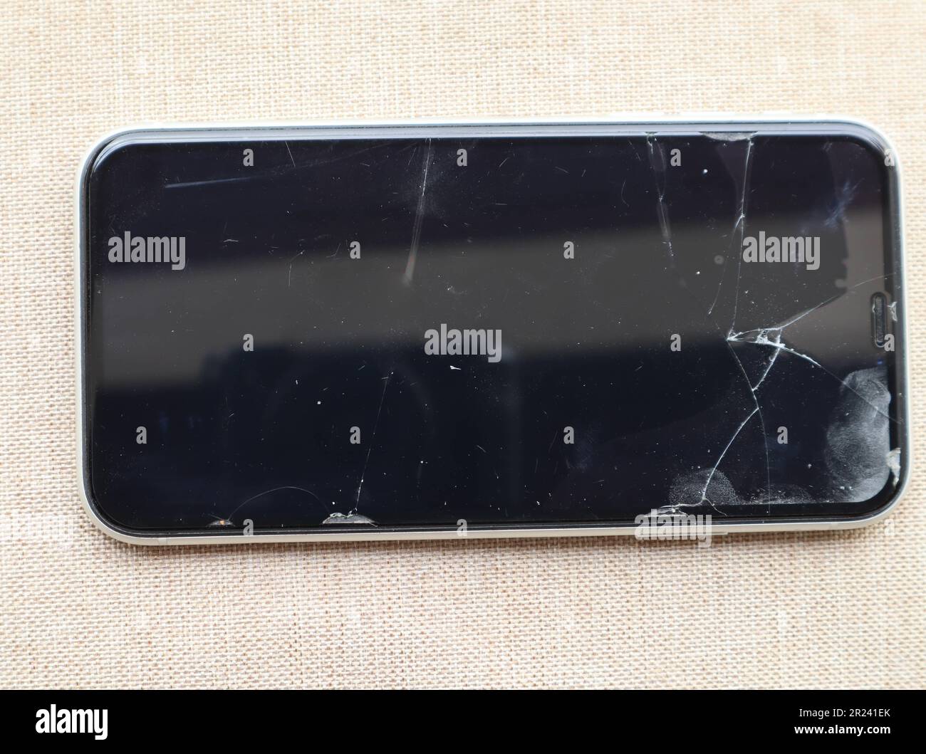 Broken glass shield or film screen cover of smartphone -  safety and protection concept Stock Photo