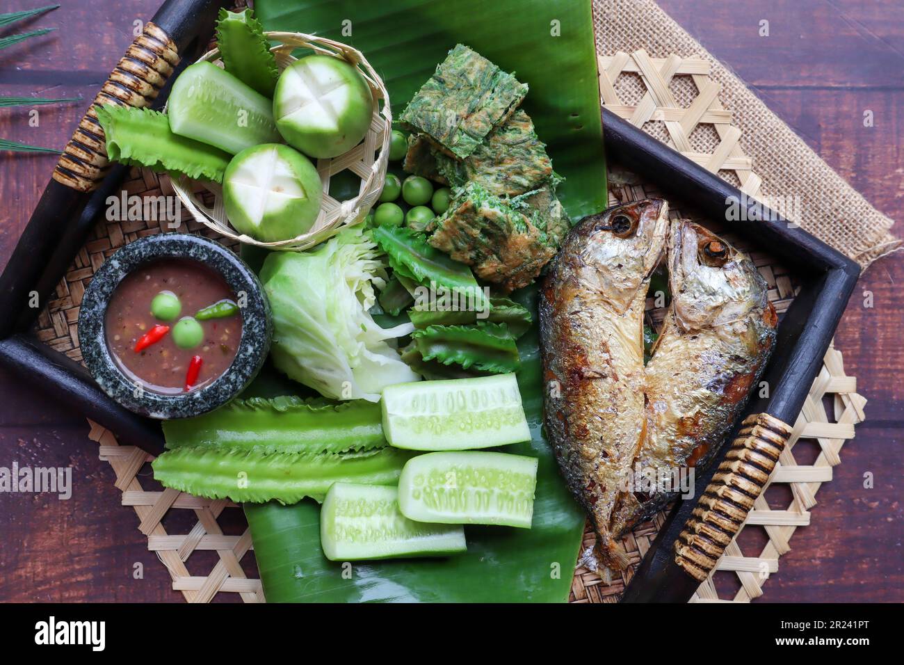 Thai Chili shrimp paste with vegetables and fried mackerel Thai food