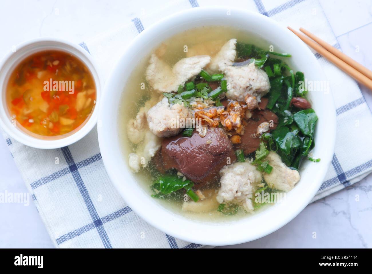 Thai Style clear soup of pork blood, pork and minced pork ( Thai