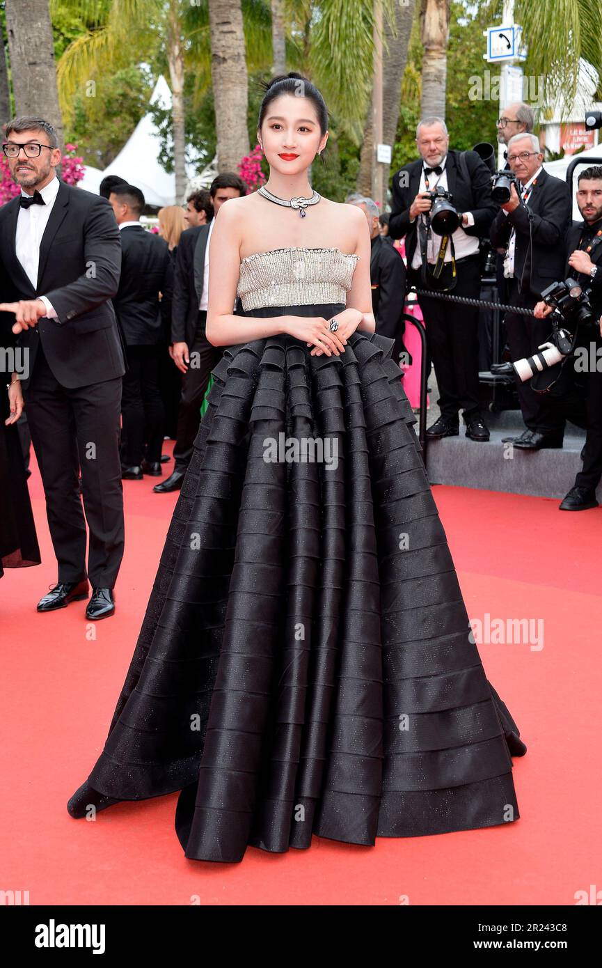 Guan Xiaotong attends the opening ceremony red carpet at the 76th