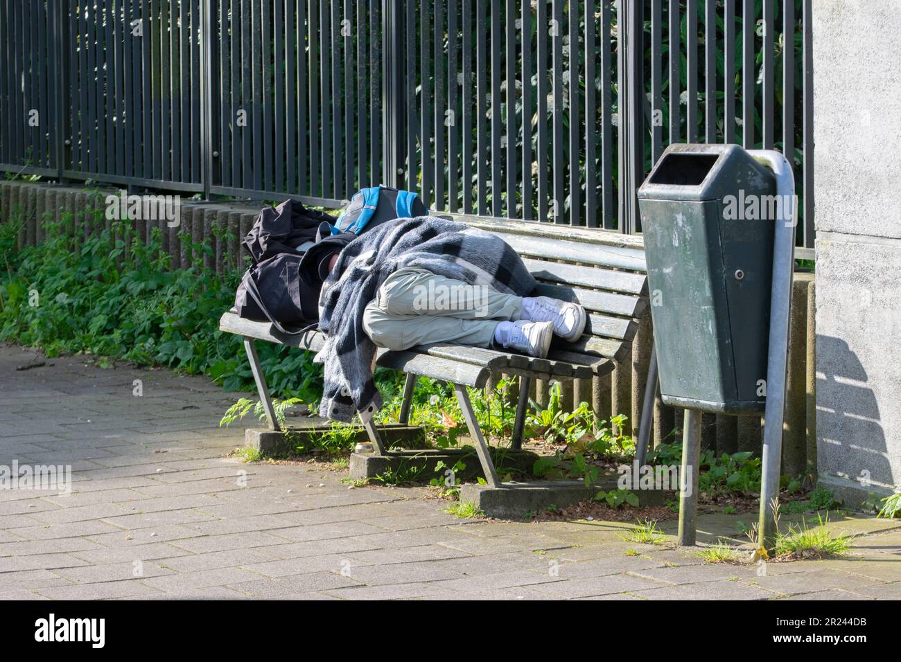 Homeless Man Sleeping On A Bench At Amsterdam The Netherlands 1752023 Stock Photo Alamy
