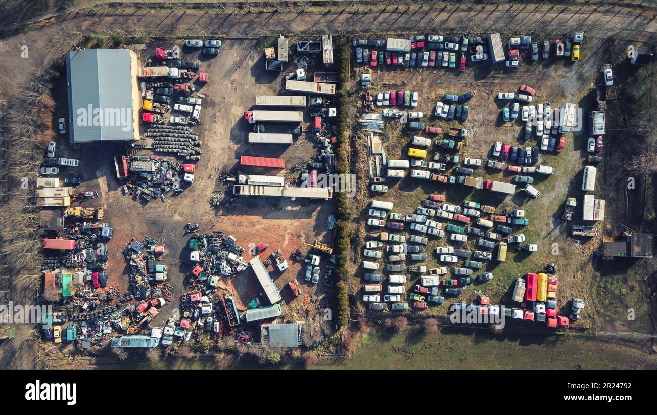 Aerial top view of a scrap yard. Scrapped cars and vehicles. Drone view. Stock Photo