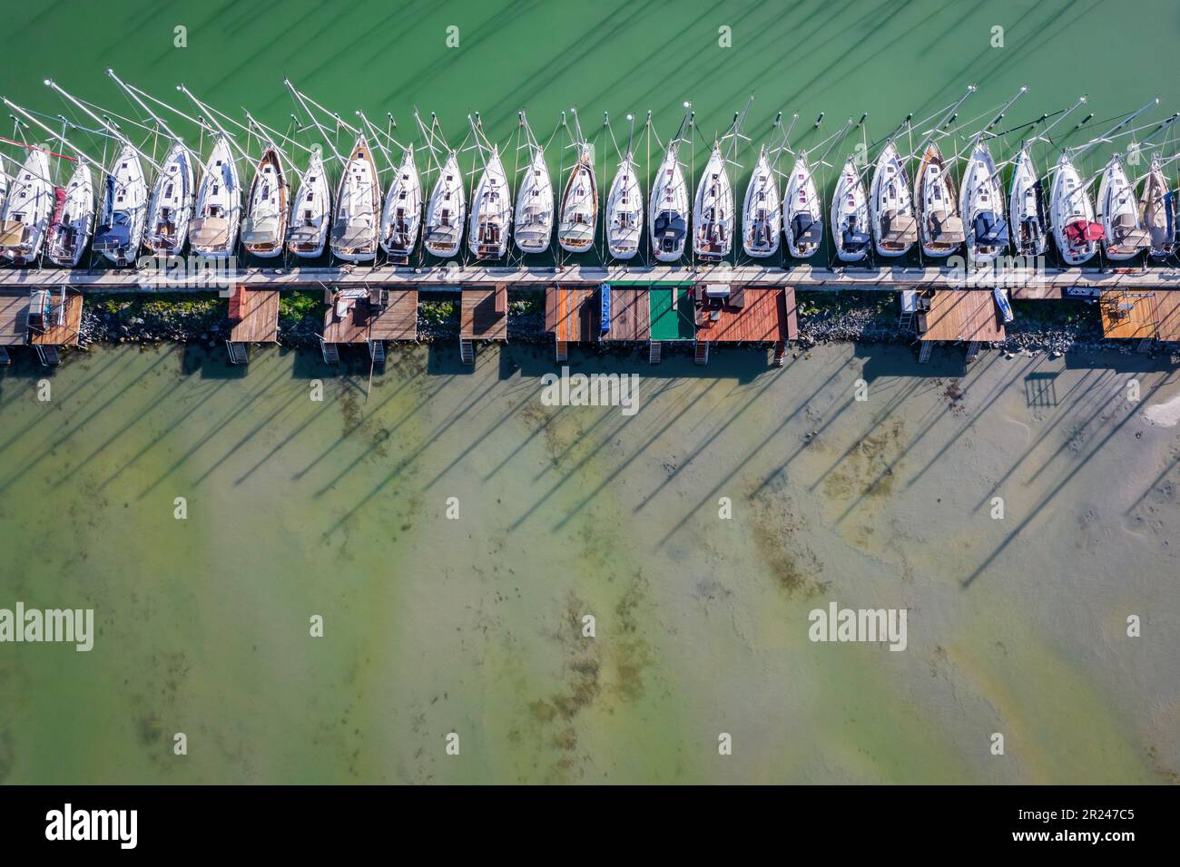 Aerial view of a Yacht club on the lake. Drone view. Sail boats dock ...