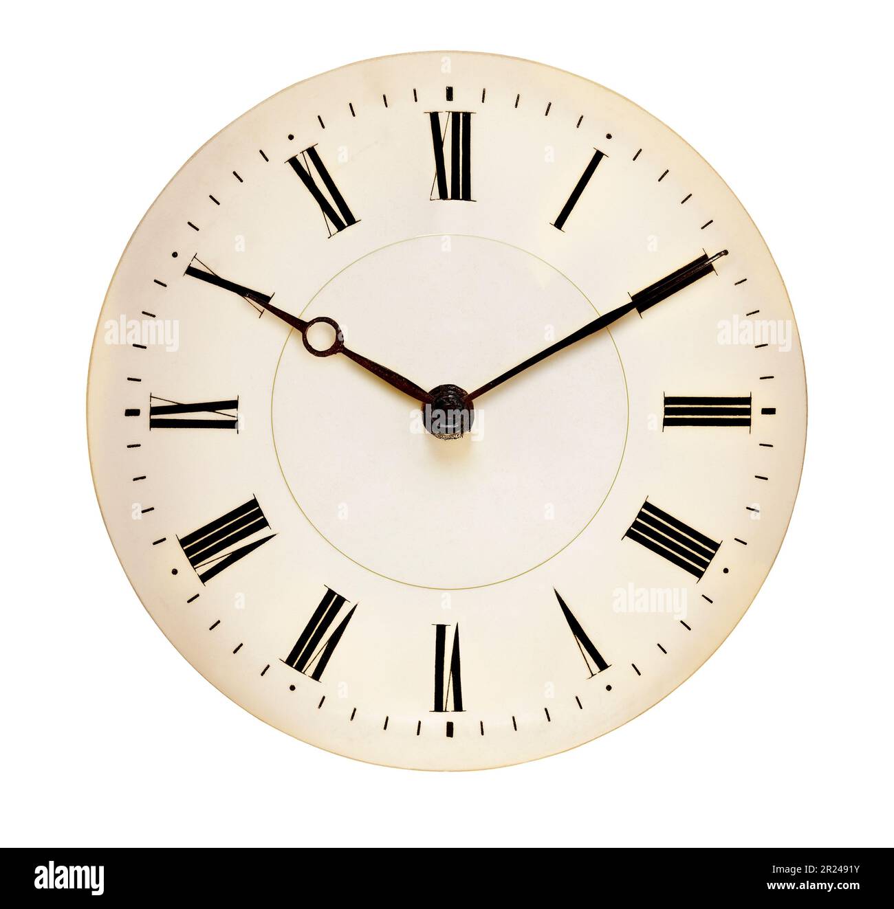 Antique clock face pointing at ten past ten o'clock isolated against