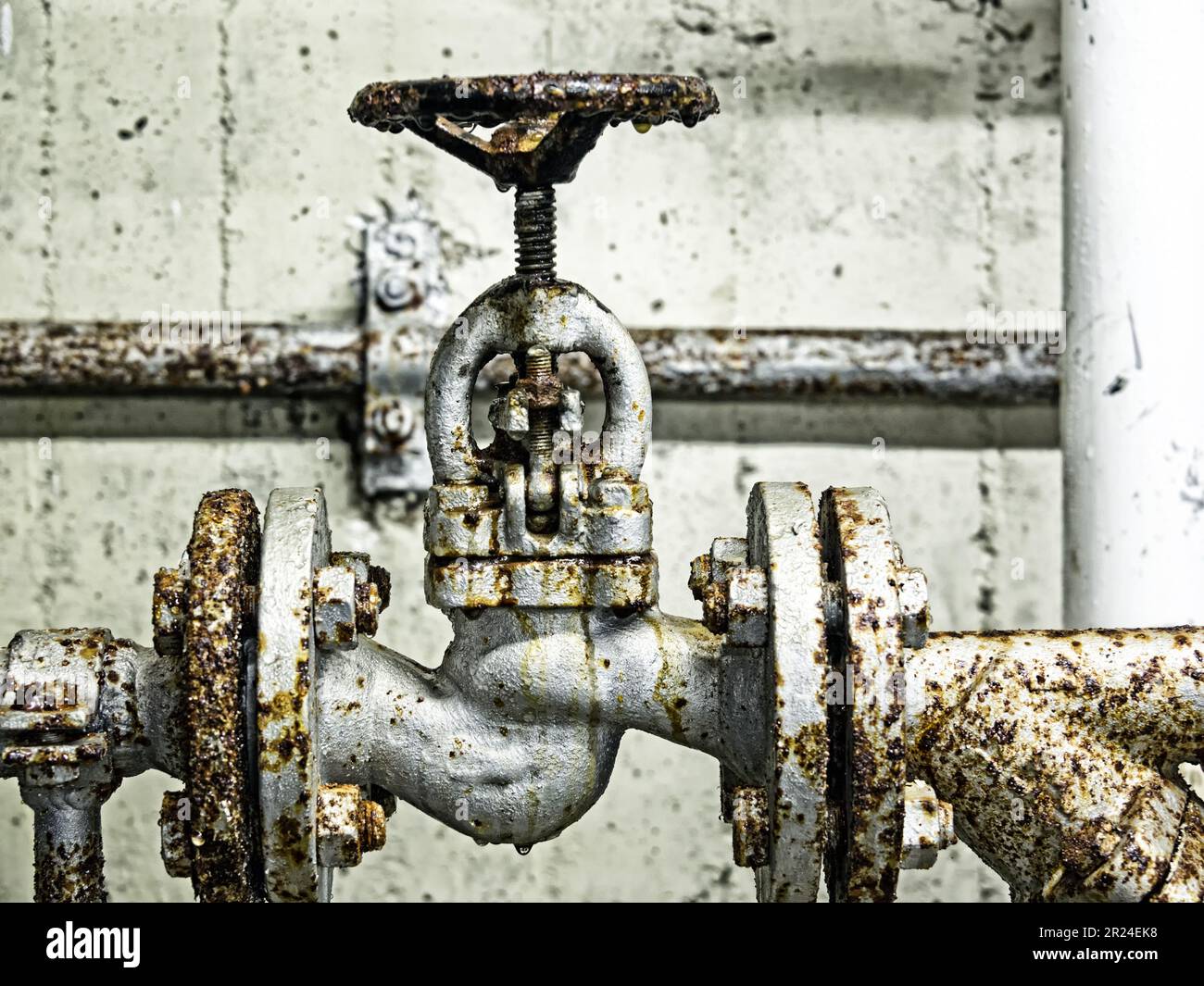 Close-up of an old rusted shut-off valve Stock Photo