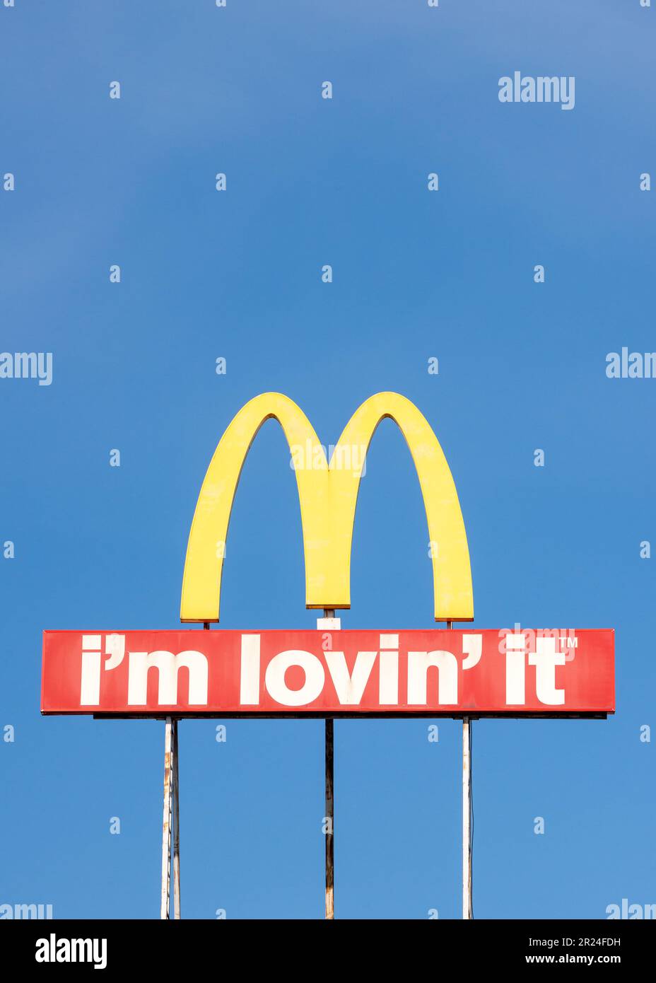 McDonald's logo sign and I'm Lovin' It slogan with copy space Stock Photo