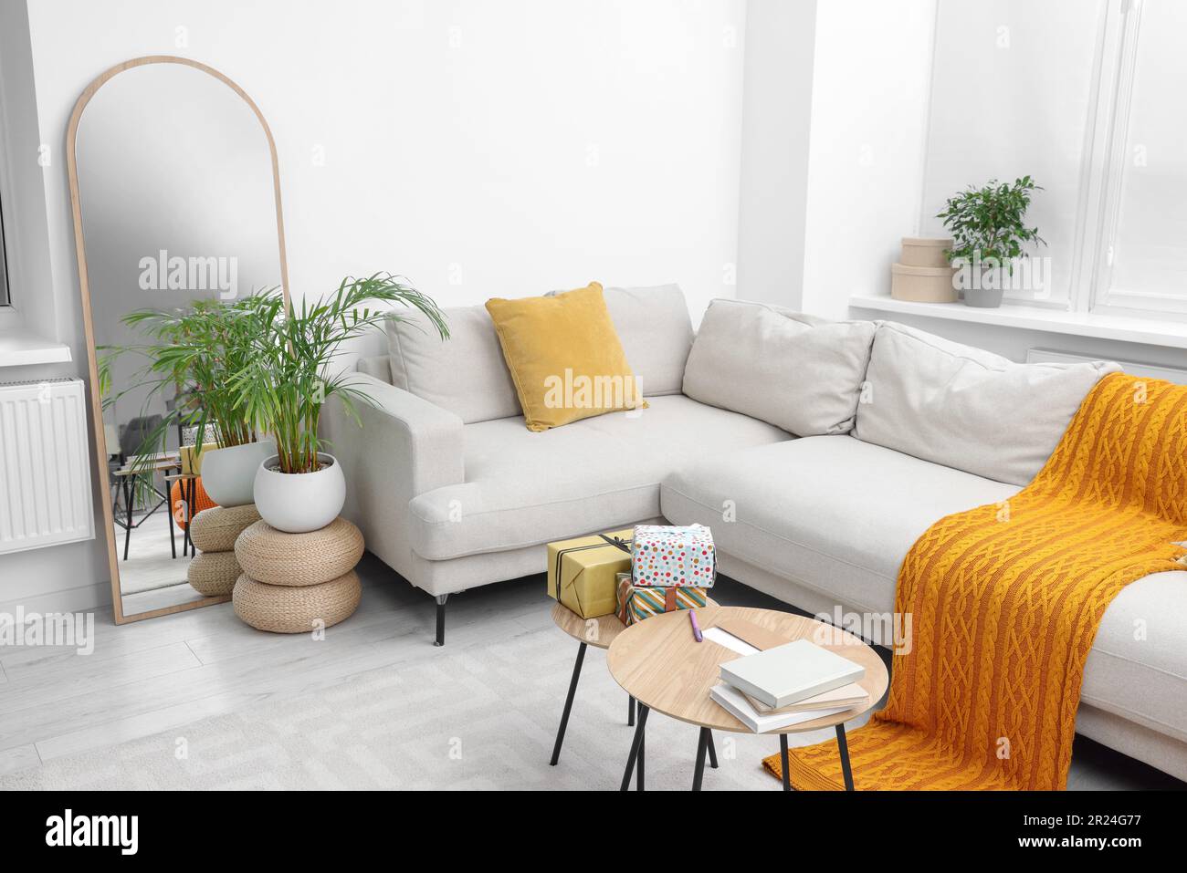 Gift boxes on table in living room Stock Photo