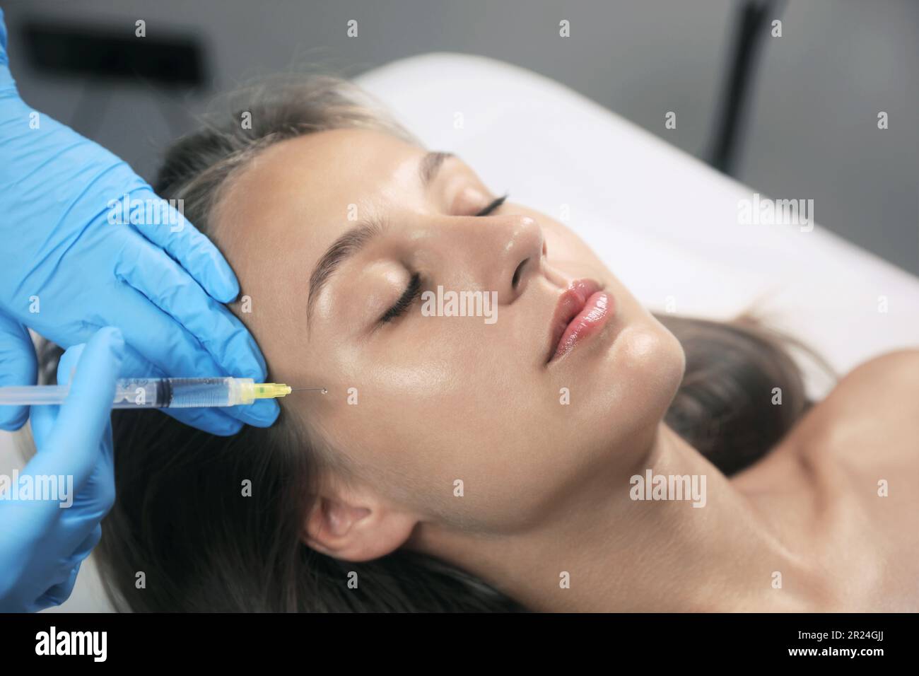 Beautiful Woman Getting Facial Injection In Salon Stock Photo Alamy