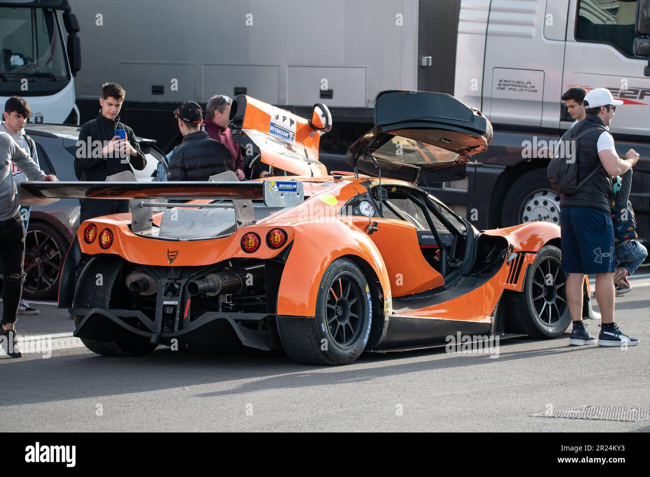 Detail of an orange and black Vortex race car from behind Stock Photo