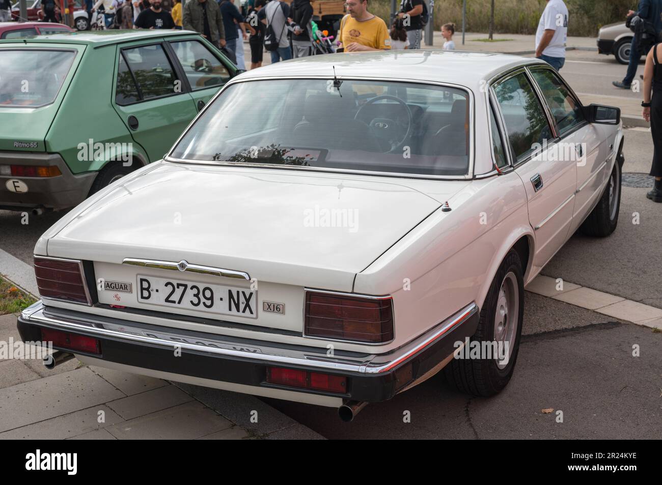 Rear view of a classic white Jaguar XJ6 parked in the street Stock Photo