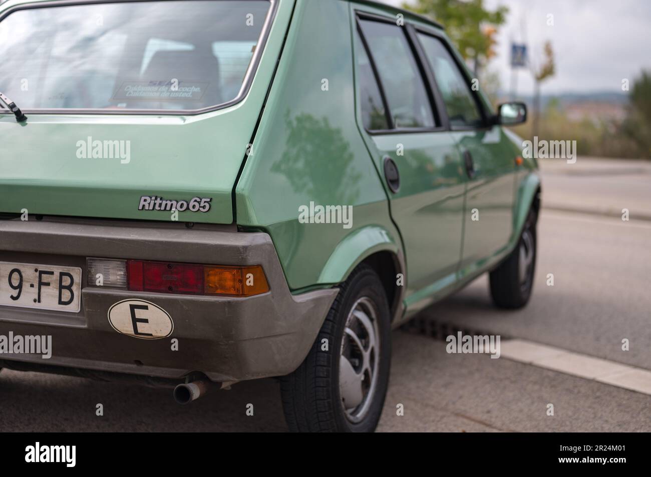 Detail of an old Spanish car, the Seat Ritmo 65 in lime green Stock Photo