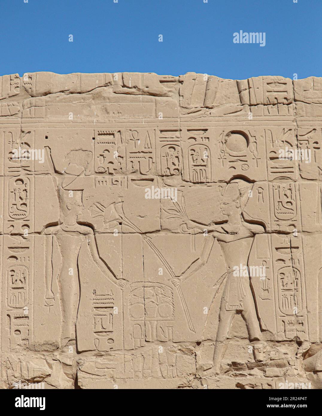 Ancient egyptian hieroglyphs carved on walls of Karnak temple in Luxor ...