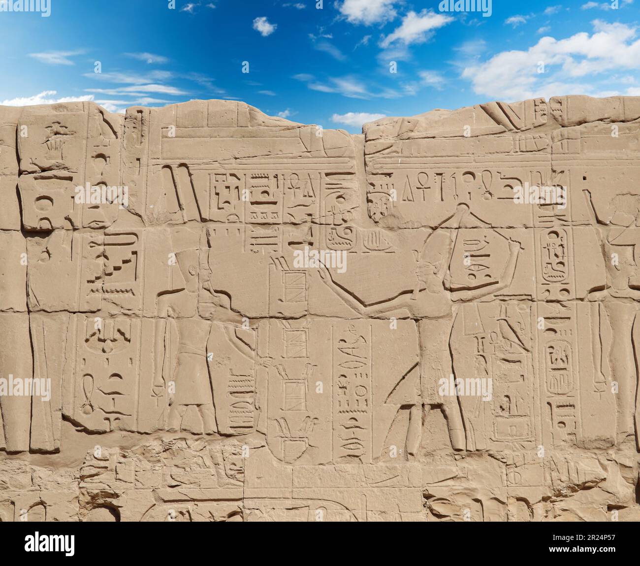 Ancient egyptian hieroglyphs carved on walls of Karnak temple in Luxor ...