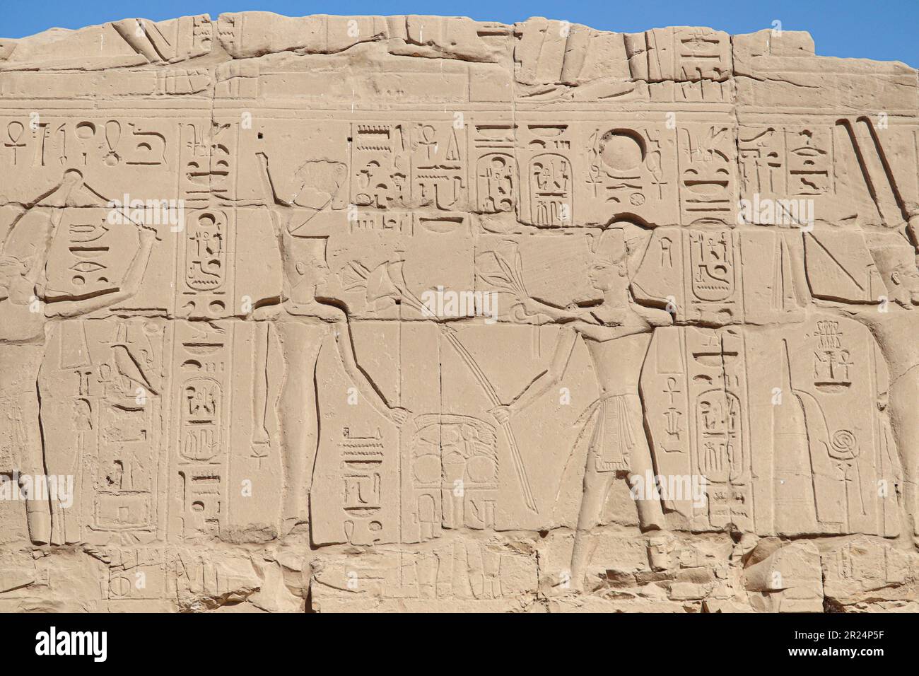 Ancient egyptian hieroglyphs carved on walls of Karnak temple in Luxor ...