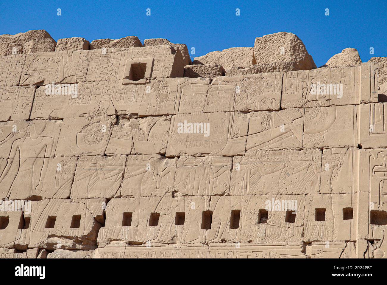 Ancient egyptian hieroglyphs carved on walls of Karnak temple in Luxor ...