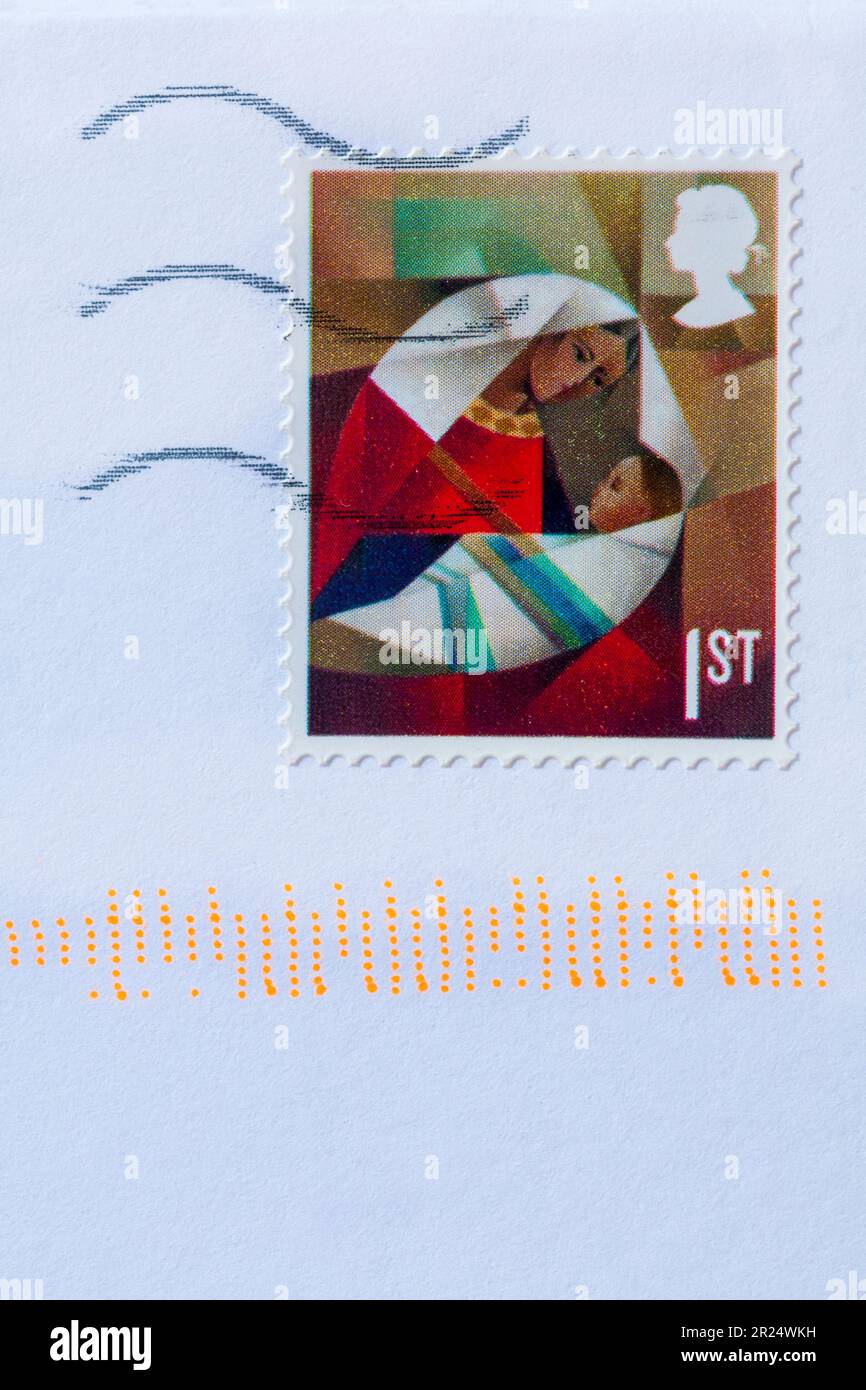 1st class Christmas stamp stuck on white envelope 2022 Stock Photo