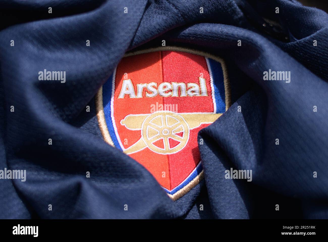Arsenal Football club badge on shirt Stock Photo