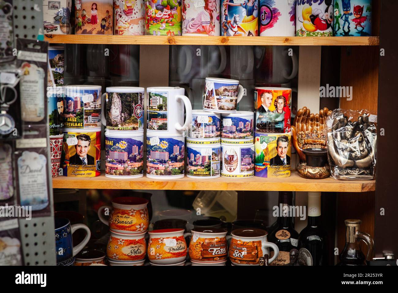 Picture of mugs for sale in a souvenir shop of Baile Herculane, Romania, with the faces of Nicolae and Elena Ceausescu. Nicolae Ceaușescu was a Romani Stock Photo