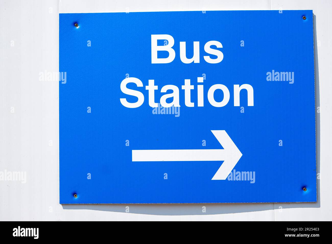 Close up of arrow pointing to Bus Station UK Stock Photo