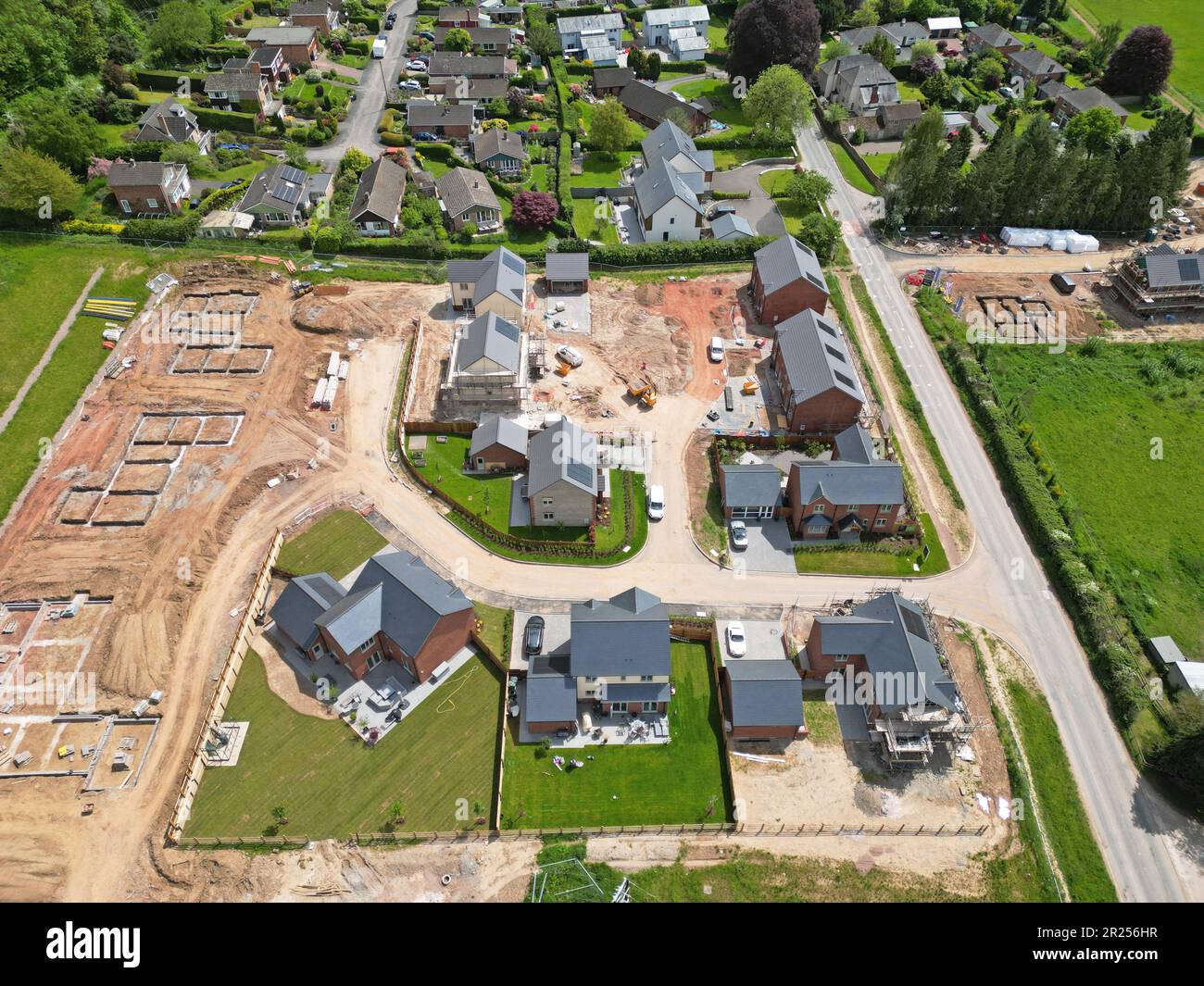 Aerial view of new build housing construction site on the edge of