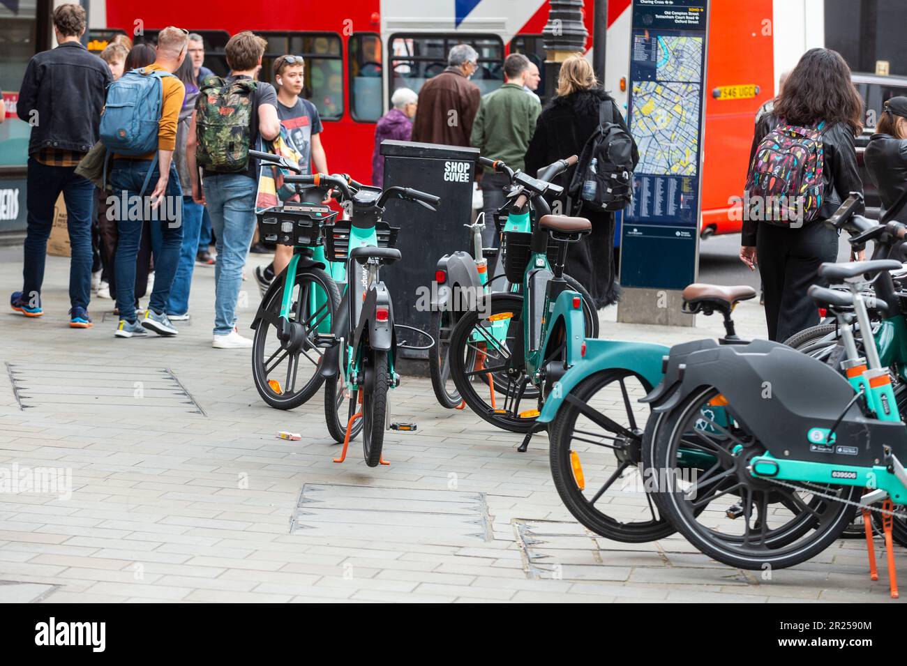 London, UK. 17 May 2023. The public passes electric hire cycles on a