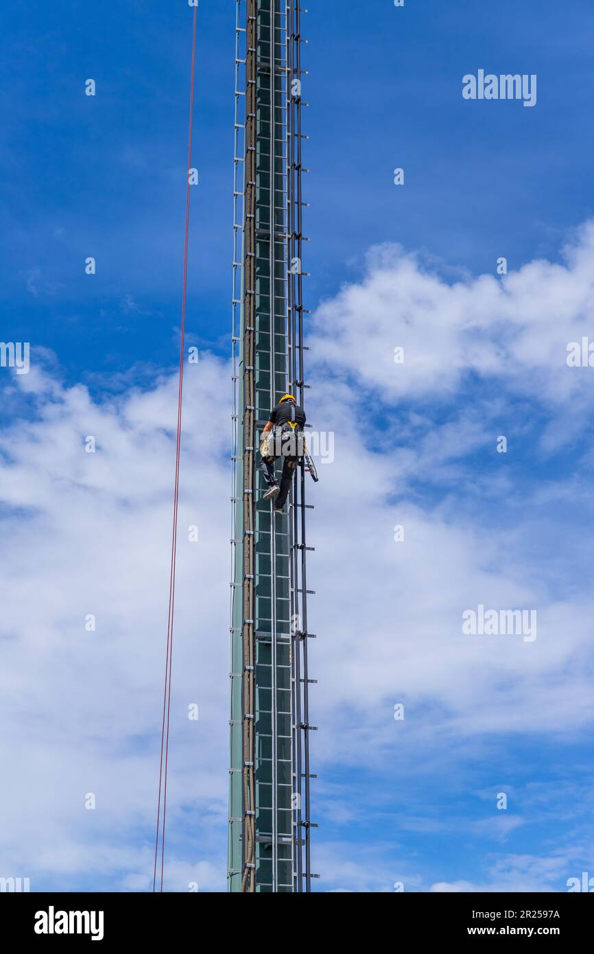 Fatima, Portugal: 30 April 2023: Working at a cellphone antenna tower for maintaining. technician worker repair telecommunication tower. Fatima, Portu Stock Photo