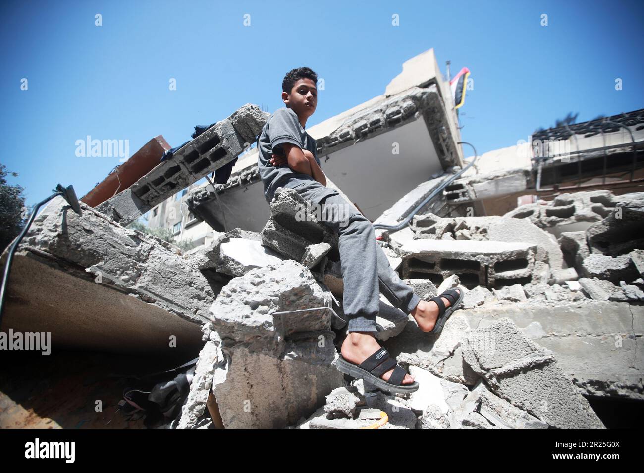 Portrait of a Palestinian boy. His house was destroyed in the Israeli airstrike in Deir Al-Balah in central Gaza Strip. This is following the recent fighting between Islamic Jihad militant group and Israel in Gaza. Palestine. Stock Photo