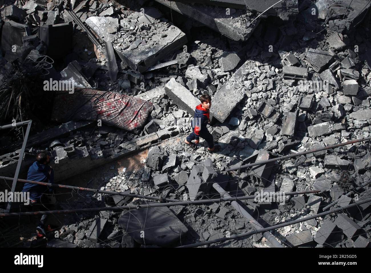 A Palestinian boy. His house was destroyed in the Israeli airstrike in Deir Al-Balah in central Gaza Strip. This is following the recent fighting between Islamic Jihad militant group and Israel in Gaza. Palestine. Stock Photo