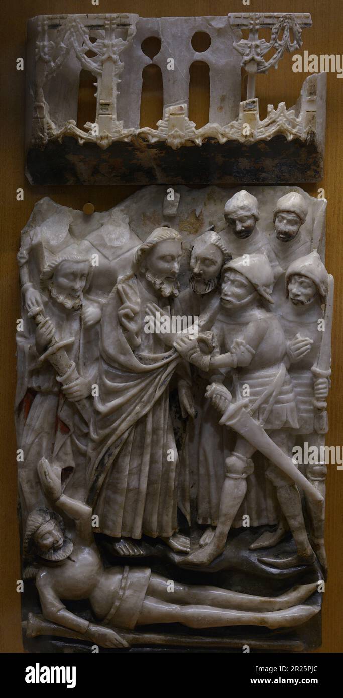 Relief depicting a scene from the Passion of Christ, 15th century. The Kiss of Judas and the Arrest of Christ. Alabaster. From Nottingham Workshops (England). Carmo Archaeological Museum. Lisbon, Portugal. Stock Photo