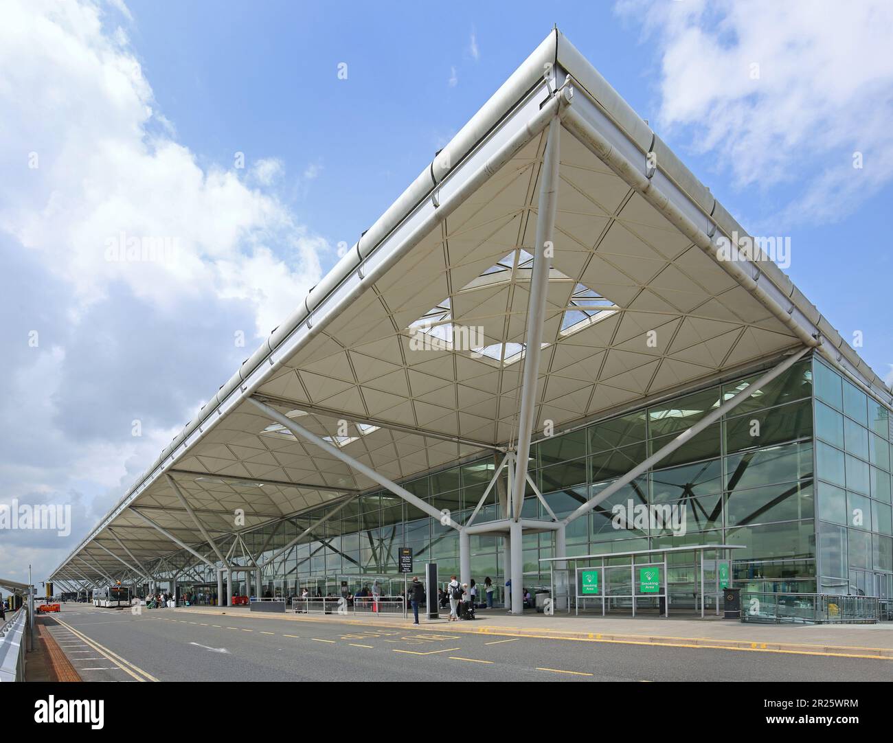 Stansted Airport, UK. Main approach road and entrance to the terminal building designed by Norman Foster. Stock Photo