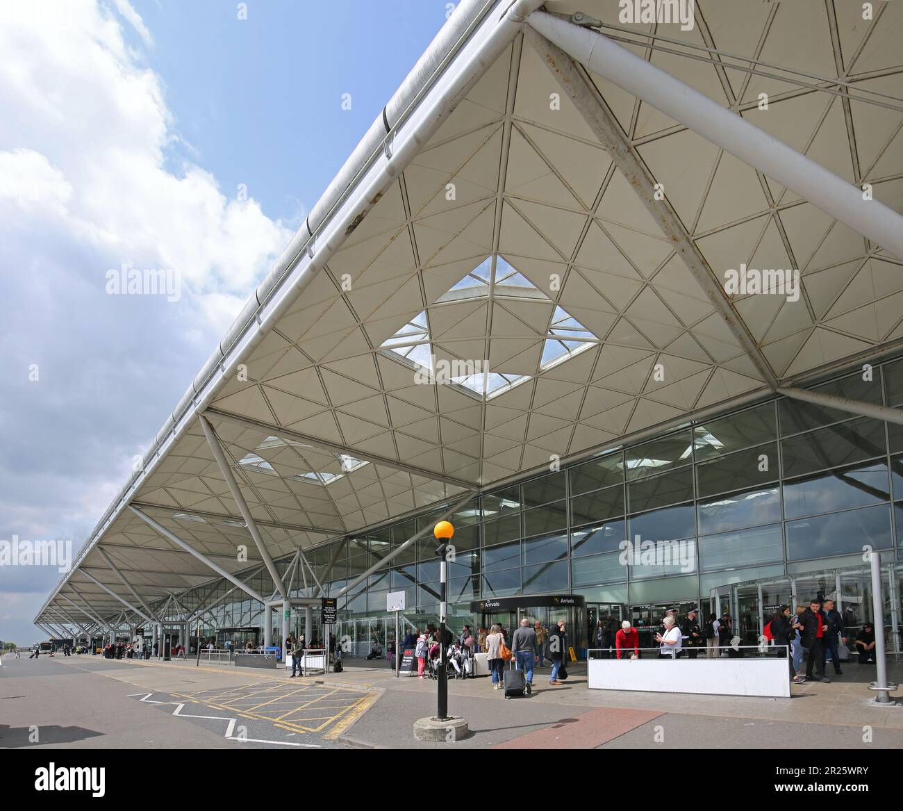 Stansted Airport, UK. Main approach road and entrance to the terminal building designed by Norman Foster. Stock Photo