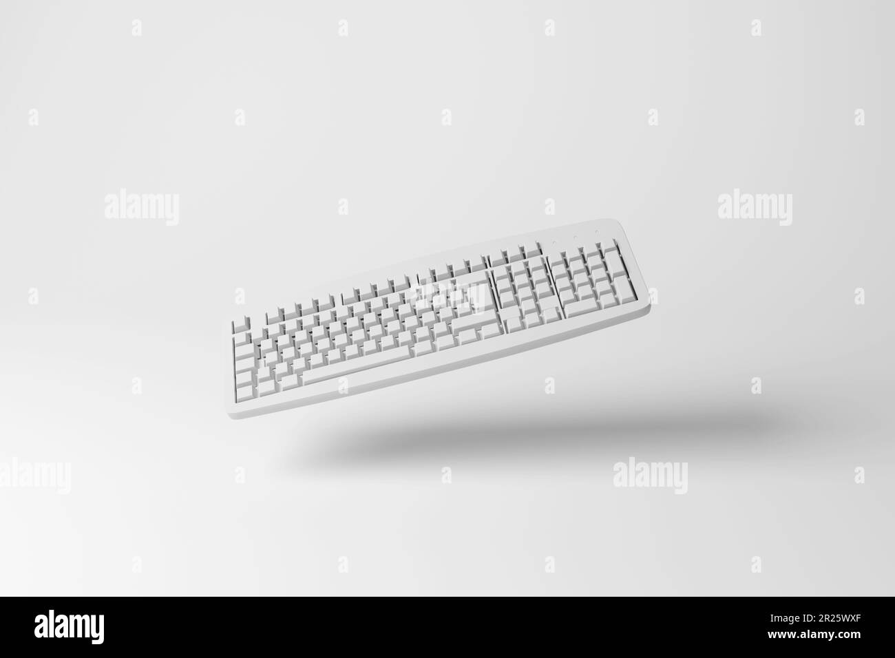 White computer keyboard floating in mid air with shadow creating