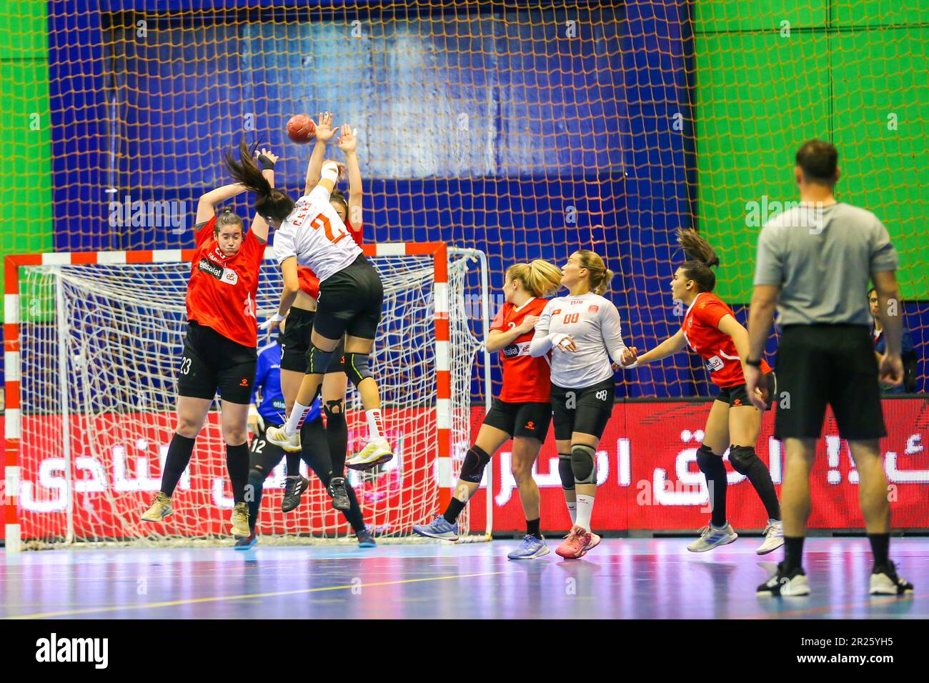 The 2023 women African Handball confederation match between Al Ahly Dames and Moknine of Tunisia in Cairo, Egypt. Stock Photo
