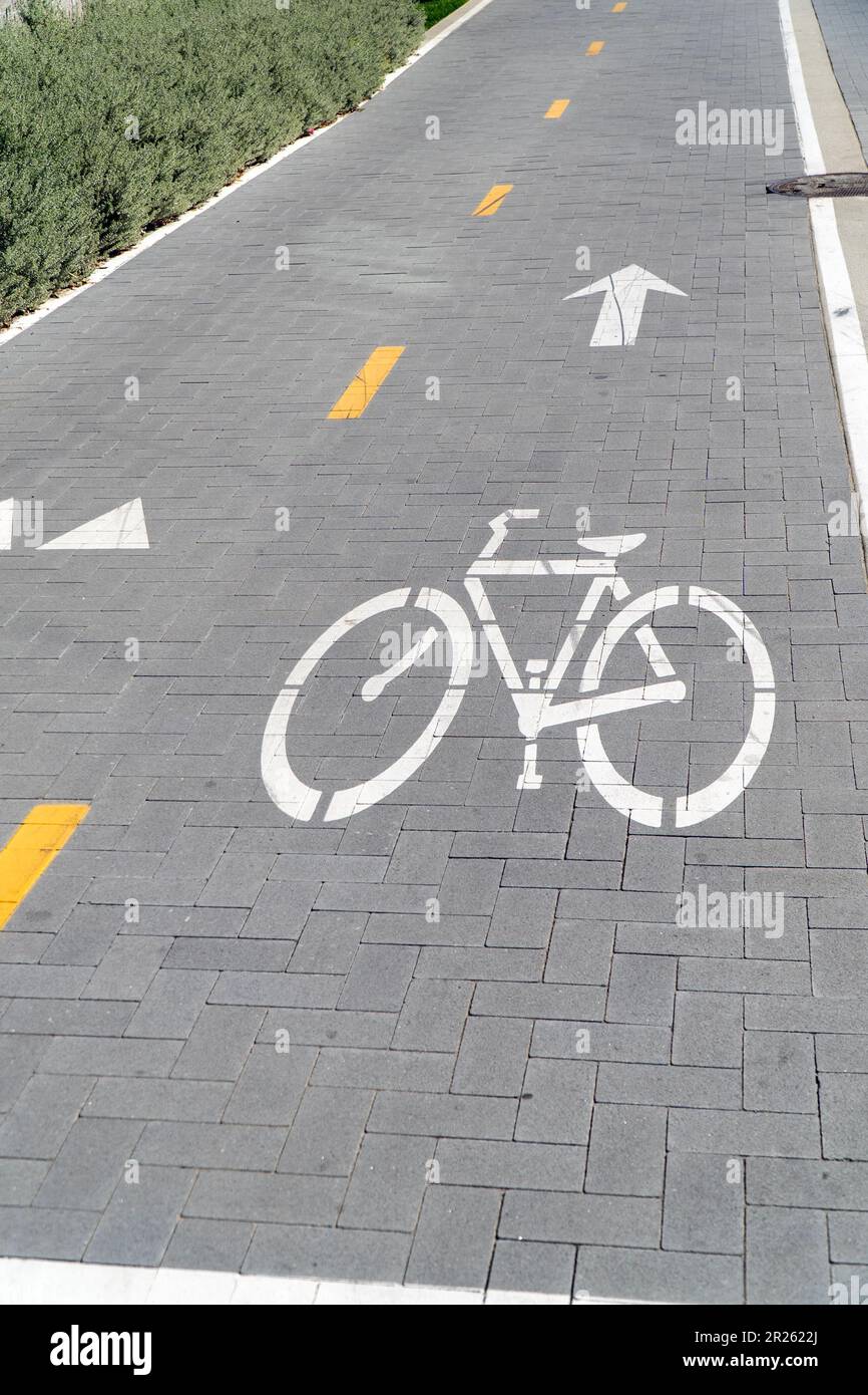 Sign of bike lane on sidewalk Stock Photo Alamy
