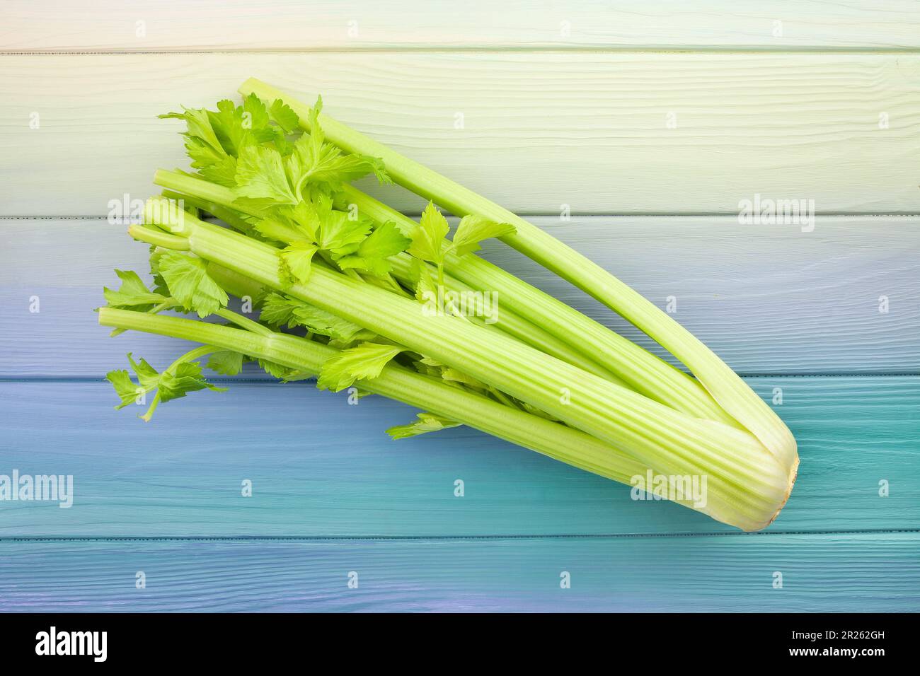 celery stalk on wood background Stock Photo