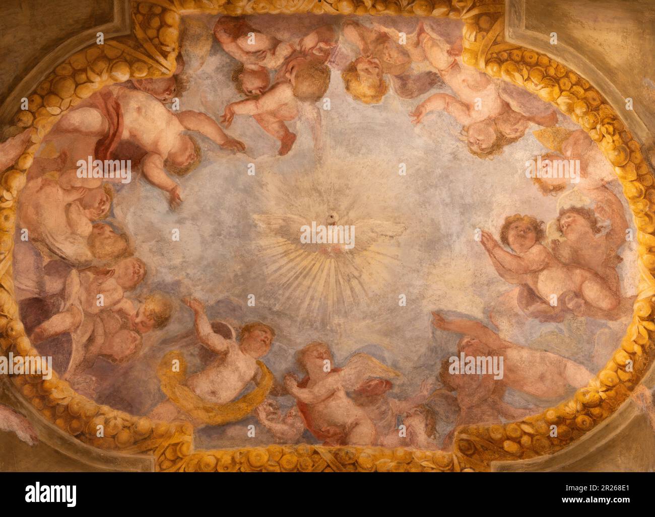 GENOVA, ITALY - MARCH 7, 2023: The baroque fresco of Holy Spirit among the angels in the church Basilica di Santa Maria delle Vigne from 18. cent. Stock Photo