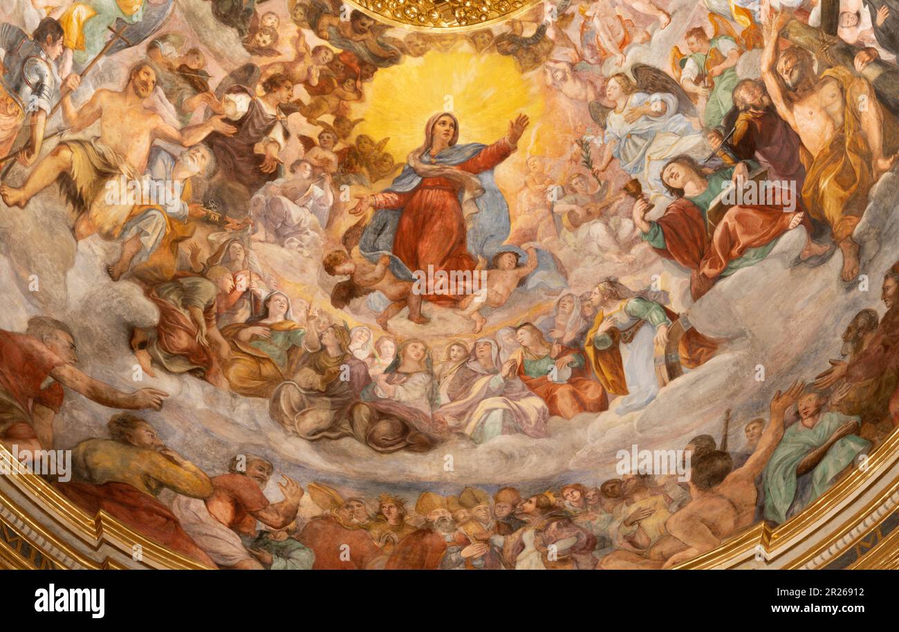 GENOVA, ITALY - MARCH 5, 2023: The fresco of Virgin Mary in the Glory from main cupola of church Chiesa del Gesu Stock Photo