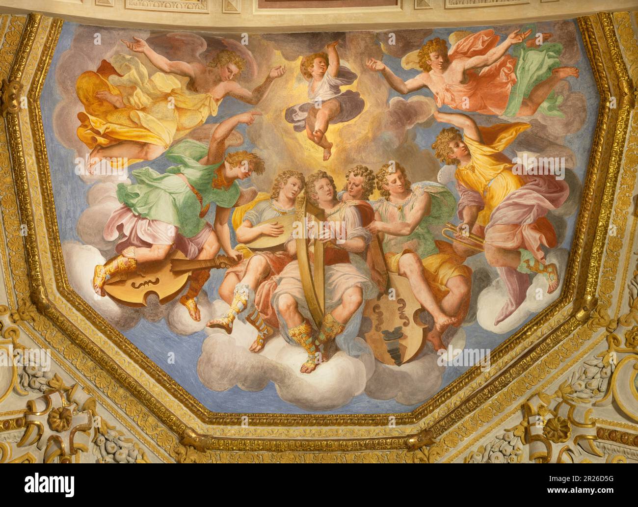 GENOVA, ITALY - MARCH 6, 2023: The ceiling fresco of Choir of angels with the music instruments in the church Chiesa di Santa Caterina Stock Photo