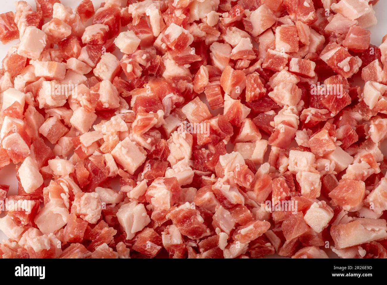 Diced bacon as full frame background texture Stock Photo Alamy
