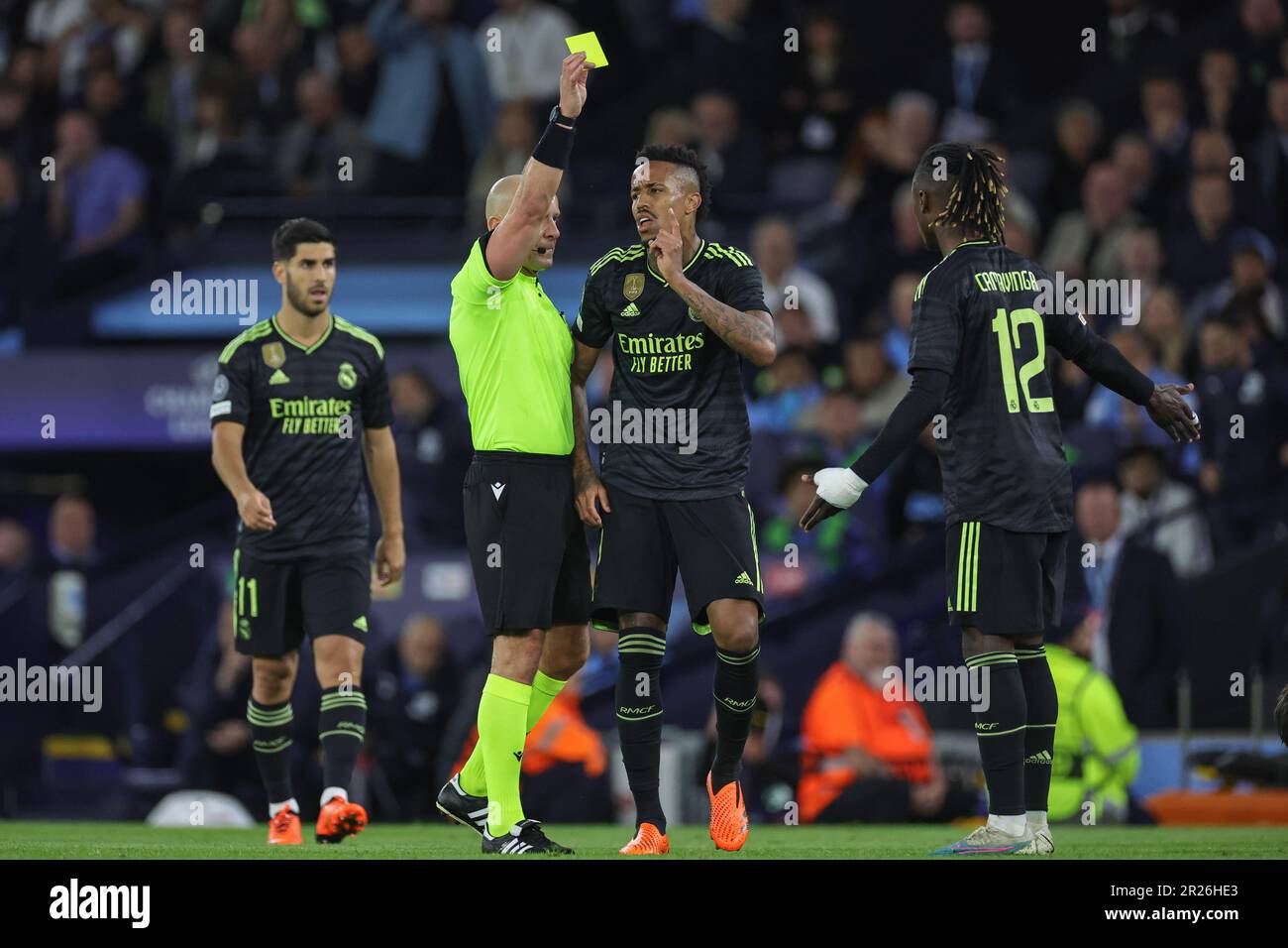 Eduardo Camavinga #12 of Real Madrid receives a yellow card from referee Szymon Marciniak during the UEFA Champions League Semi-Final Second Leg Manchester City vs Real Madrid at Etihad Stadium, Manchester, United Kingdom, 17th May 2023  (Photo by Mark Cosgrove/News Images) Stock Photo