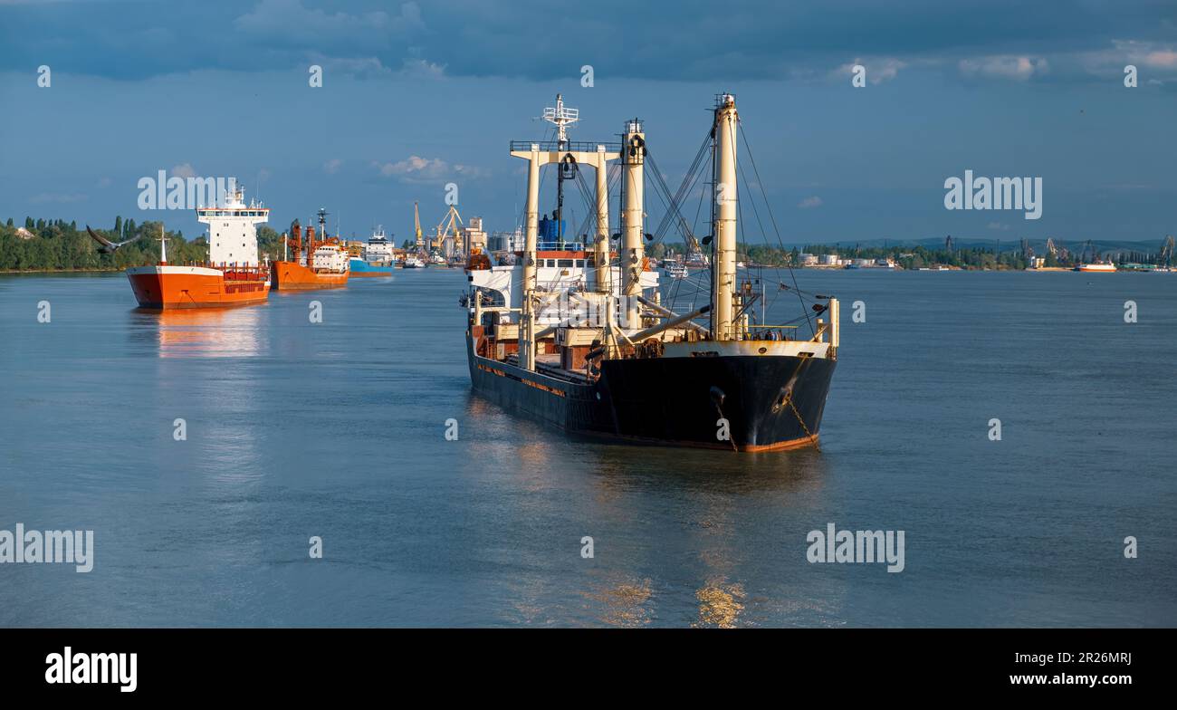 Roadstead dry-cargo ships stand anchored in the roadstead awaiting loading Stock ...