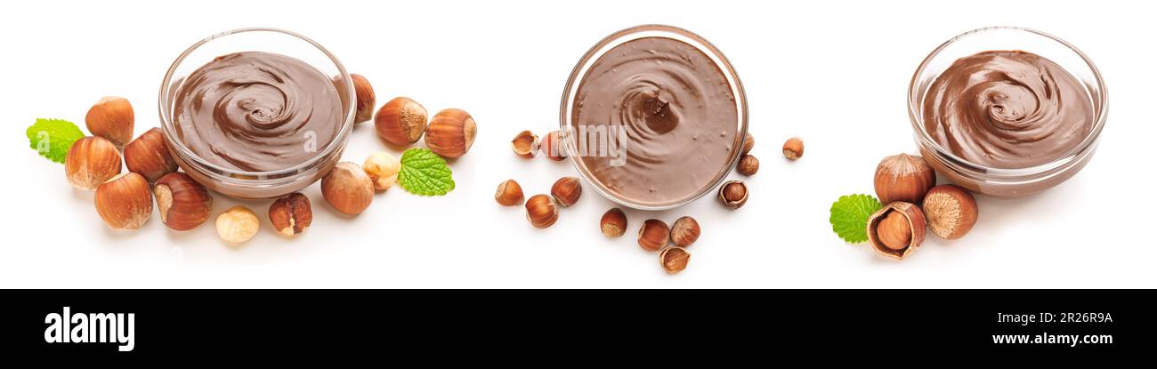 Set of tasty chocolate paste with hazelnuts on white background Stock Photo