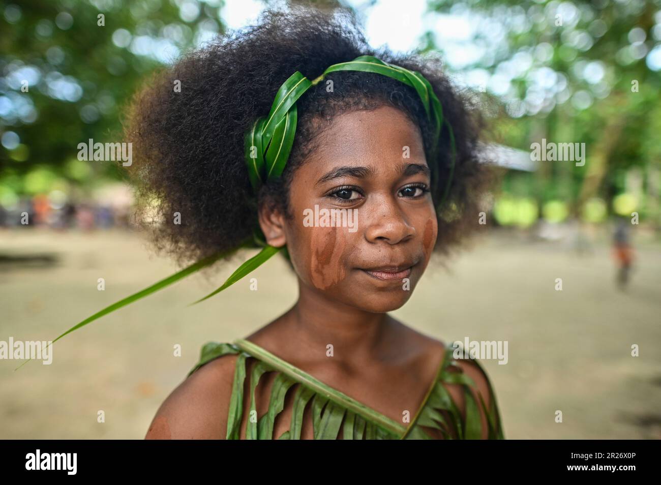 Indigenous teens of the Solomon Islands dressed in traditional outfits