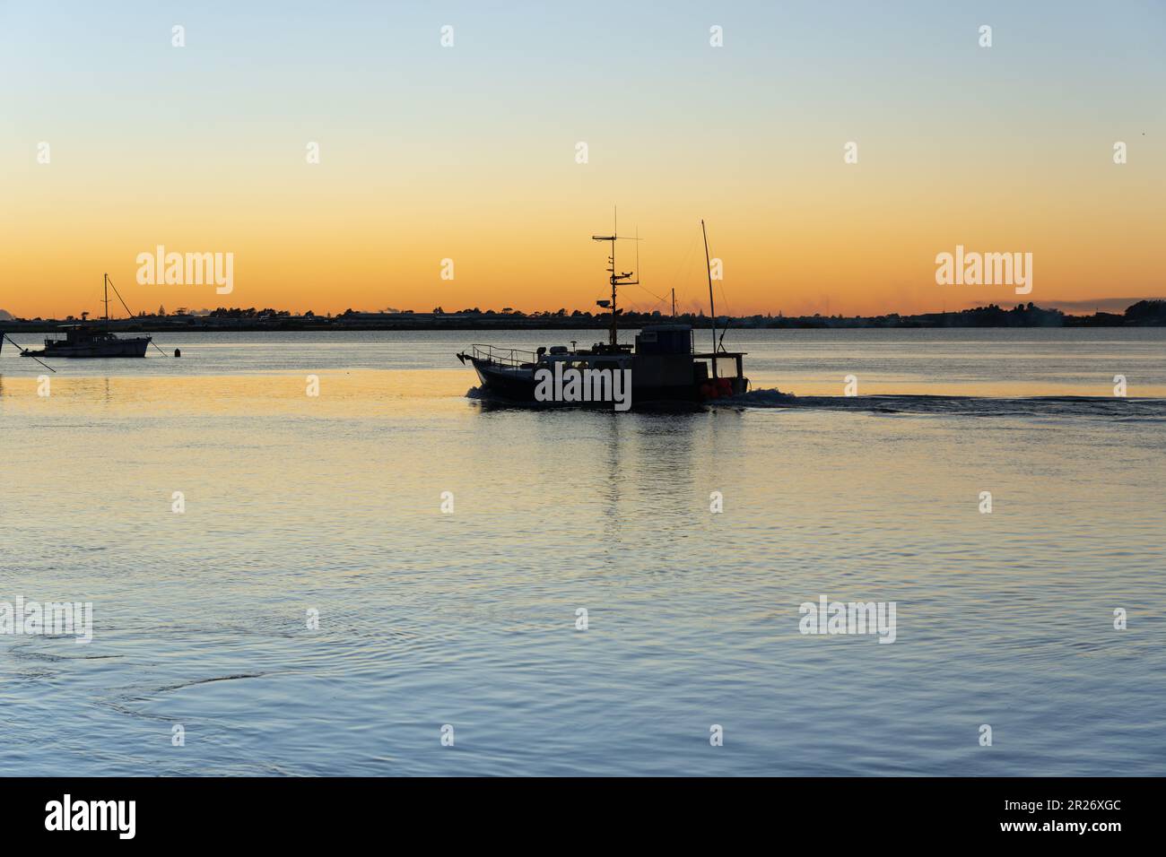 Fishing boat leaving new hi-res stock photography and images - Alamy
