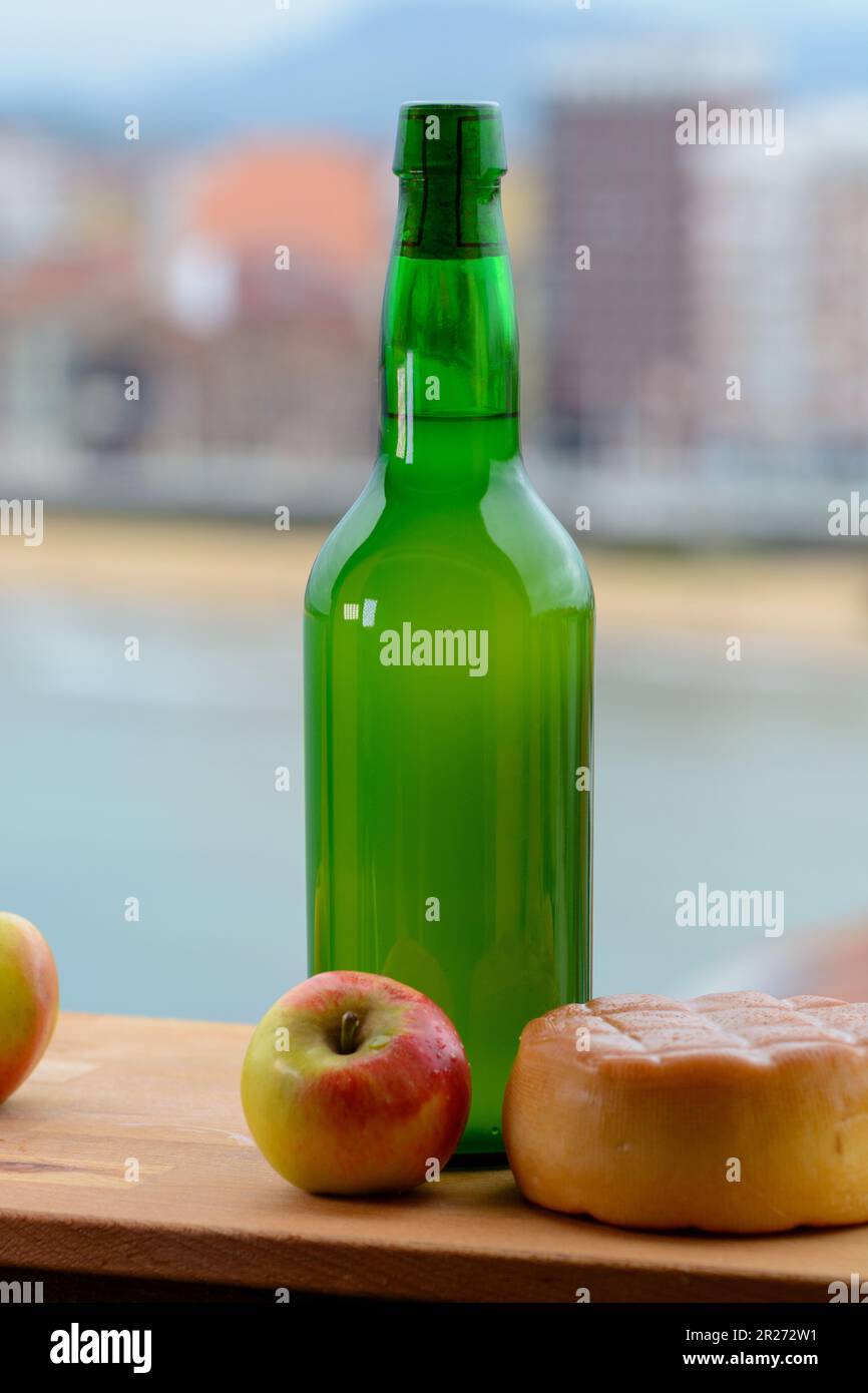 Traditional natural Asturian cider made from fermented apples in wooden