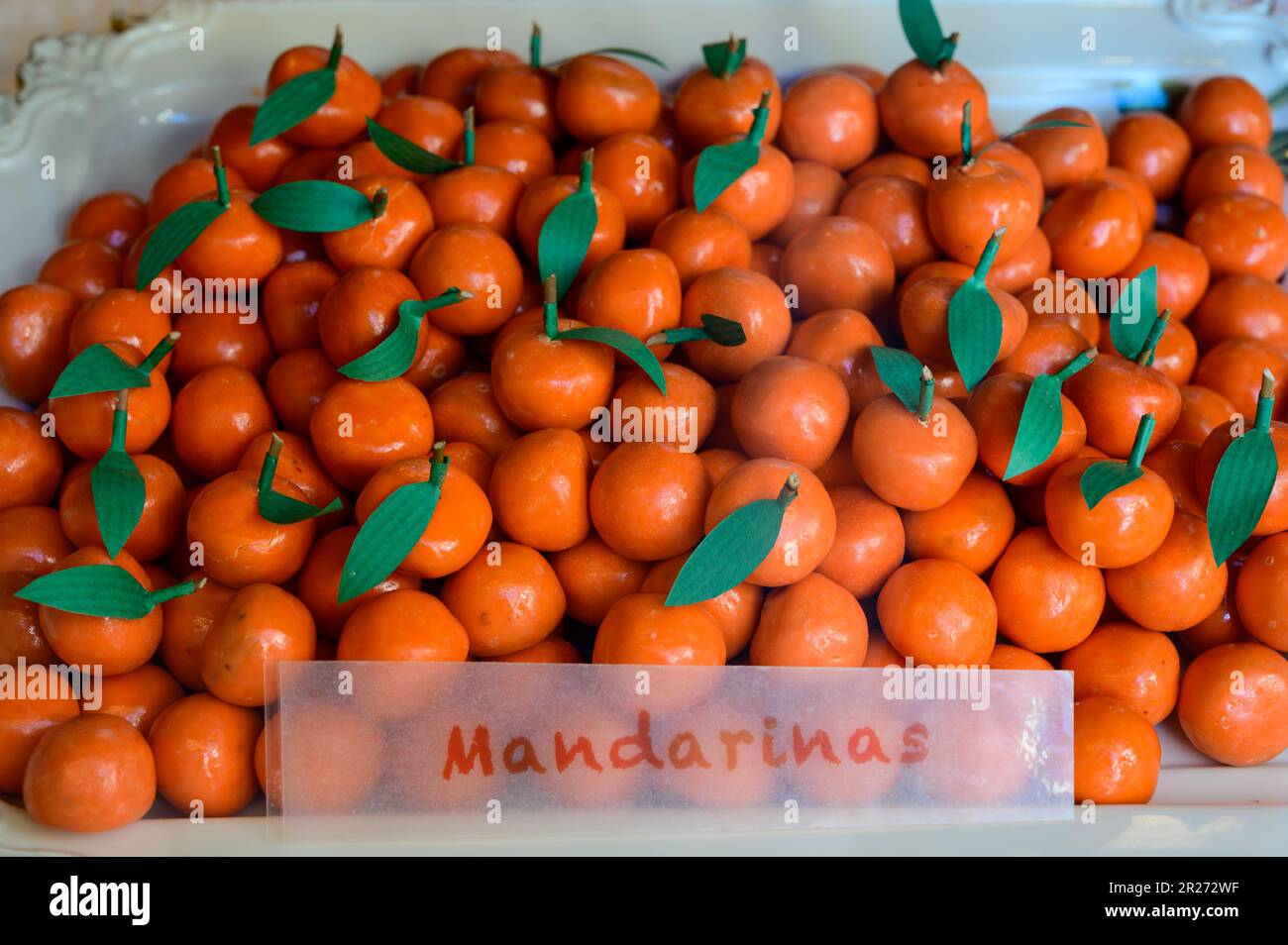 Sweet fruit candy beads in artisan Spanish confectionery shop, english  translation: mandarins, close up Stock Photo - Alamy