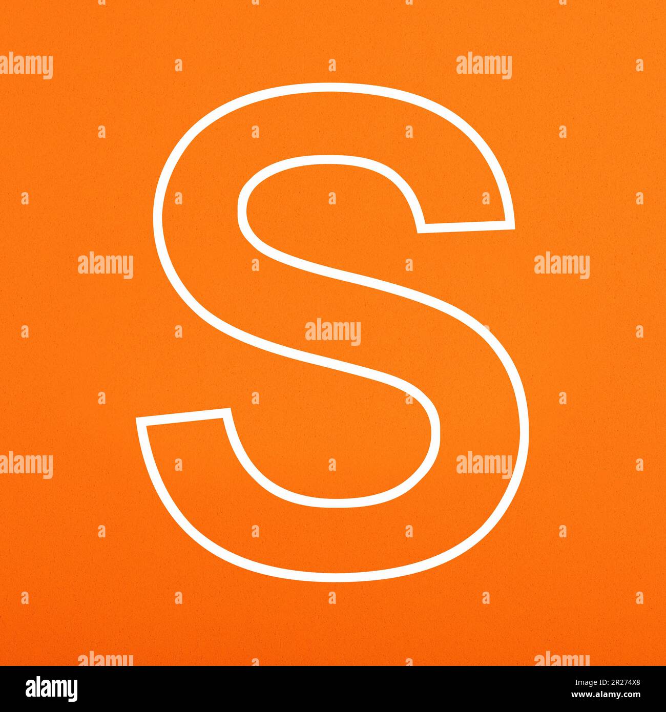 Letter S uppercase written in white color isolated on orange foamy background Stock Photo