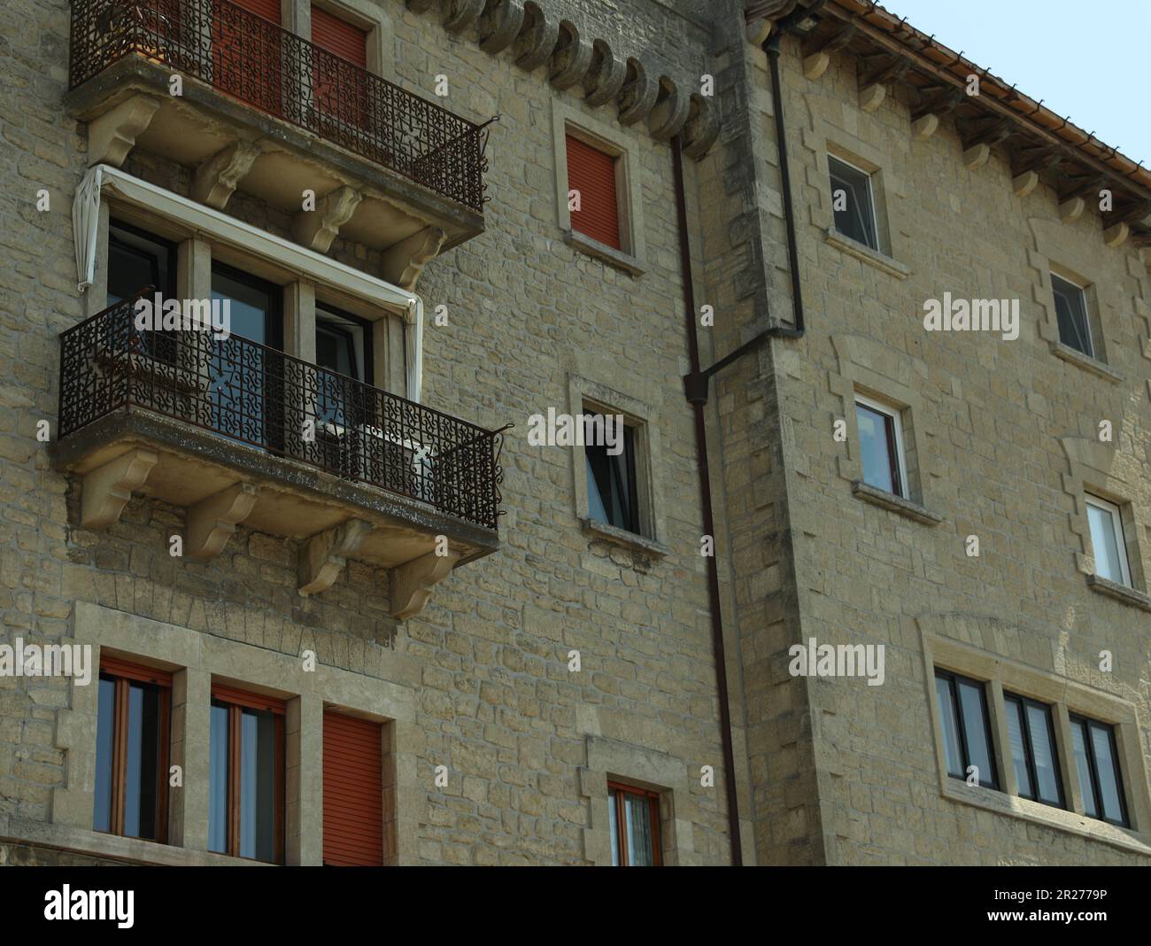 Residential building with balconies and windows in city Stock Photo - Alamy