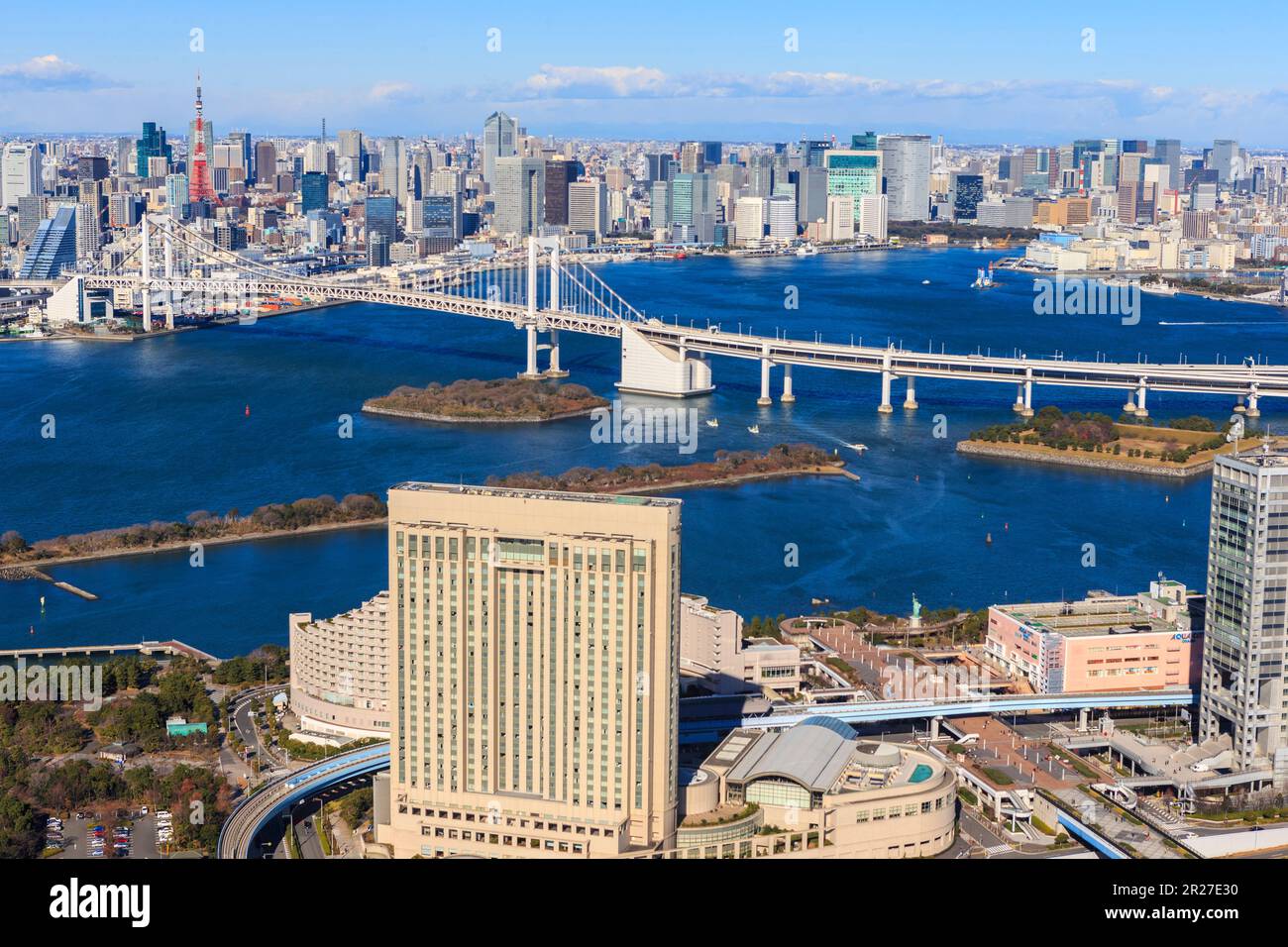 Odaiba area, Rainbow Bridge, and Tokyo Tower as seen from the sky over Shinagawa Ward Stock Photo