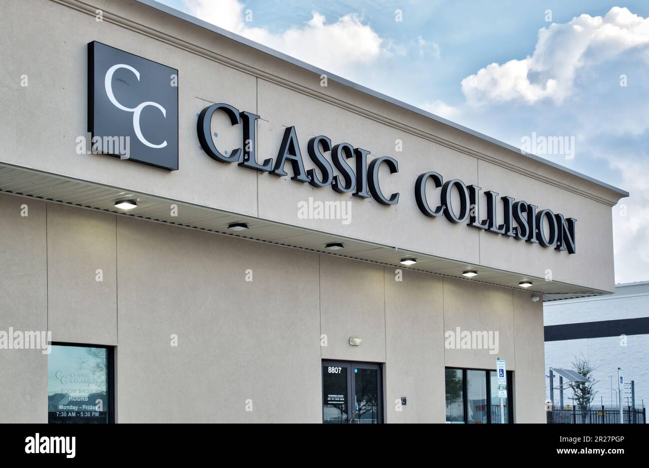 Humble, Texas USA 02-26-2023: Classic Collision business exterior storefront in Humble, TX. Vehicle repair company established in 1983. Stock Photo